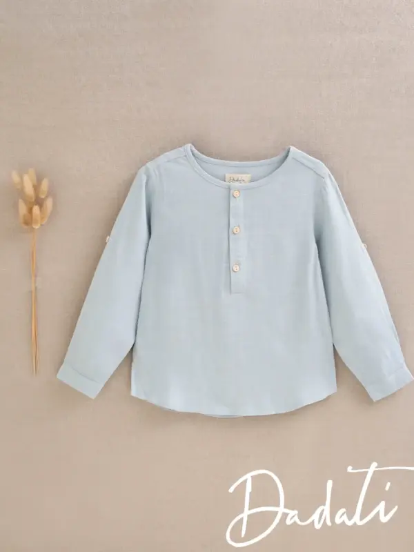 CAMISA NIÑO CUELLO REDONDO EN AGUA MARINA
