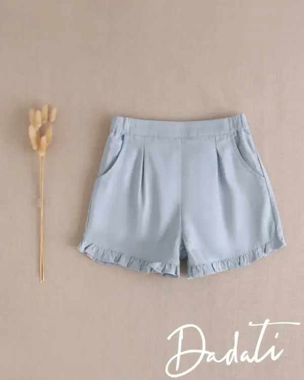 SHORT NIÑA EN AZUL CON VOLANTES