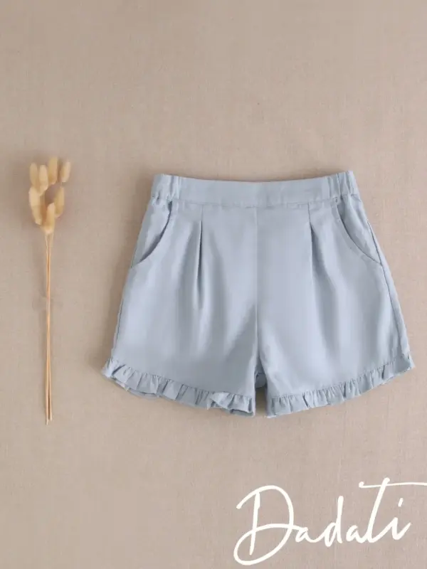 SHORT NIÑA EN AZUL CON VOLANTES