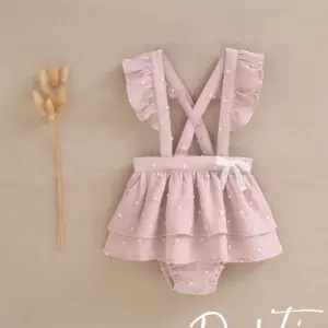 ranita bebe niña rosa plumeti con espalda cruzada y volantes