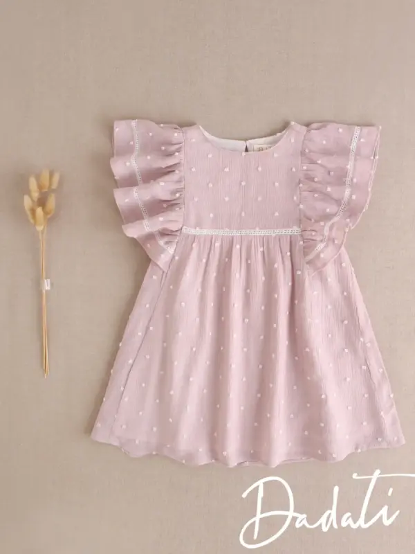 vestido niña rosa plumeti con volantes en hombro