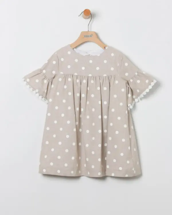 vestido manga corta en beig con lunares blancos