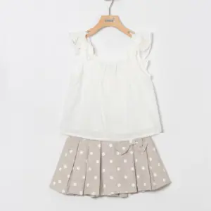 conjunto niña camida plumeti manga corta con lazada y short en lunares
