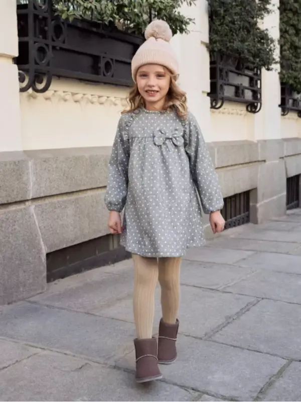 Vestido de niña en gris jaspeado con topos